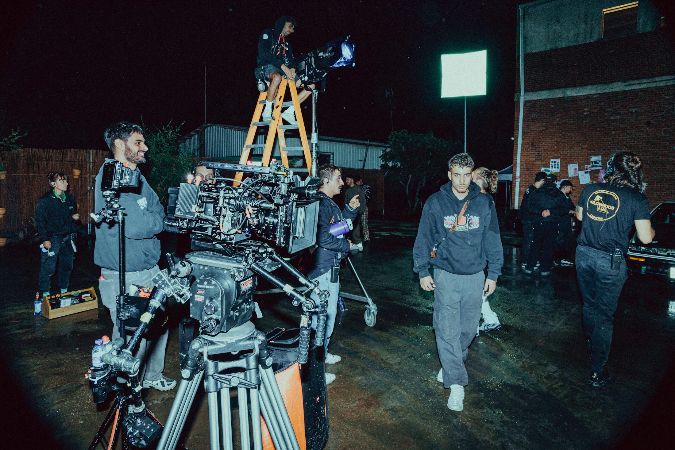 A cinema camera and crew on a night shoot